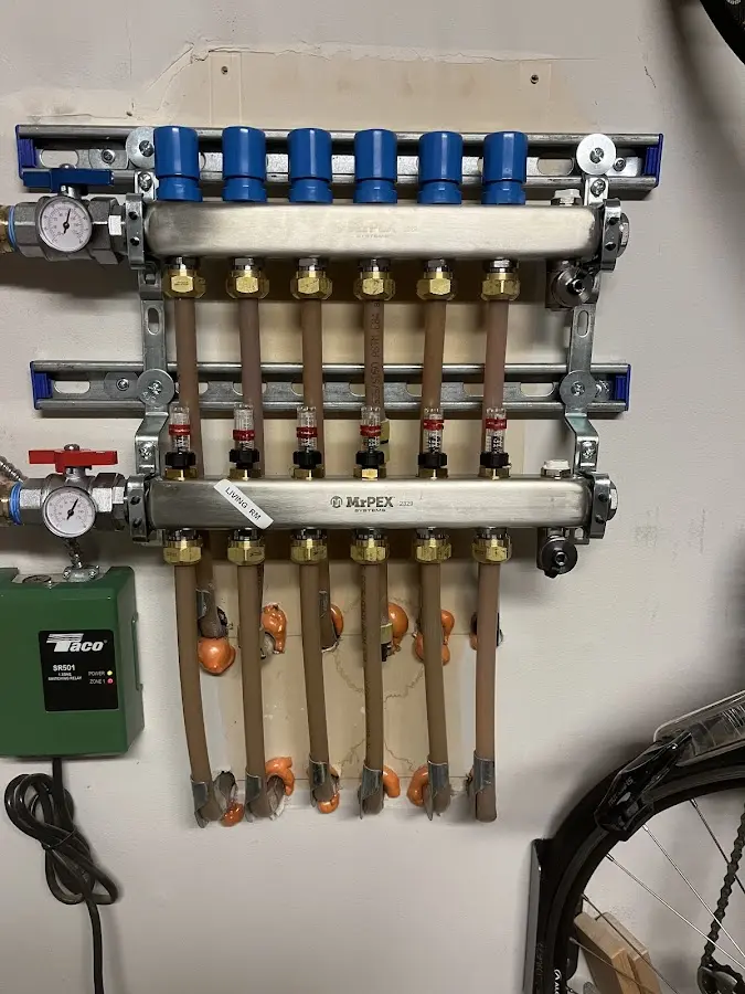 Plumber performing Gas Line Installation at a residential property in Monroe